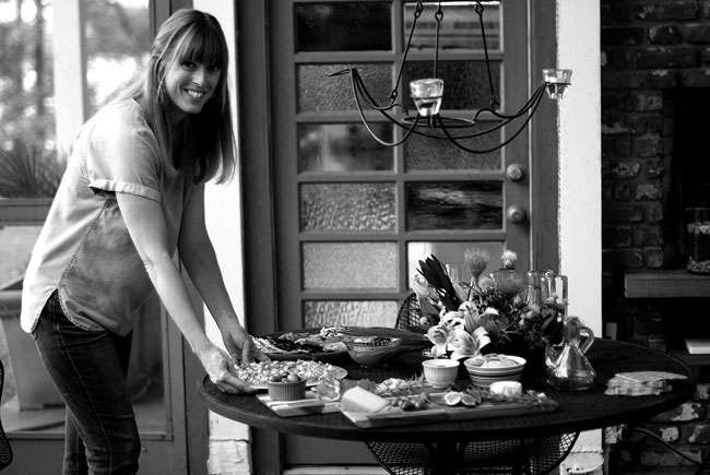 Madeline serving Mediterranean Fare